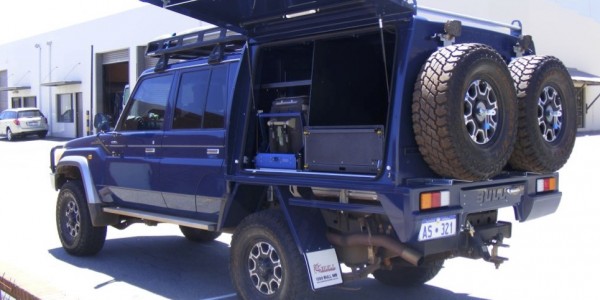 Blue Toyota Landcruiser 4